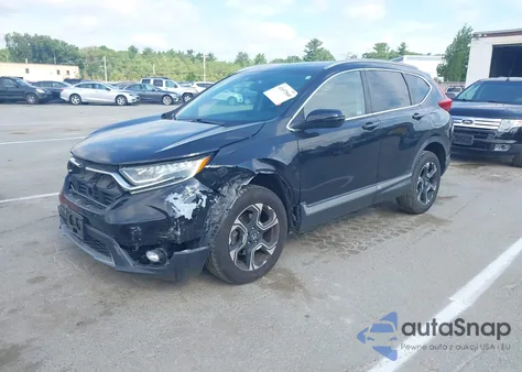 2018 Honda Cr-V Touring z USA, uszkodzony, nr VIN 7FARW2H93JE047695